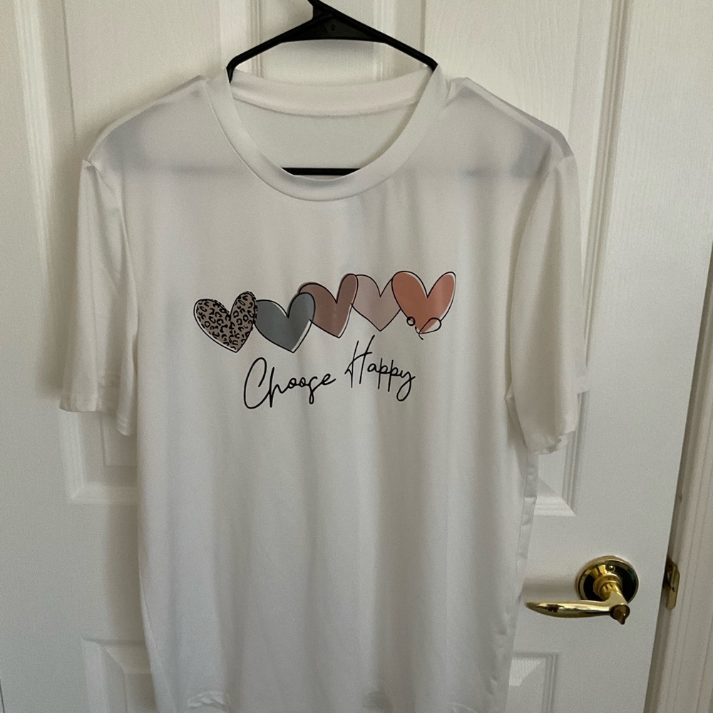 Tshirts in perfect condition never worn size L and xL sold separately $8 ea